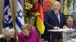 שיבח אך גם מתח ביקורת. ריבלין ומרקל צילום: עמוס בן גרשום. לע"מ חדשות