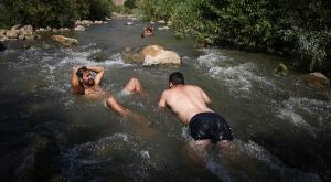 מתרחצים בנחלי רמת הגולן, ארכיון. צילום: פלאש 90 חדשות