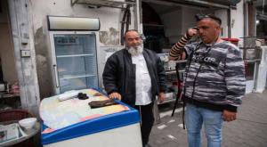 דוכן הנחת תפילין ביפו. אילוסטרציה צילום: נורה סבוסניק, פלאש90 חדשות