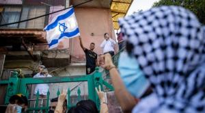 הפגנה נגד כניסת משפחות יהודיות לאזור שמעון הצדיק-שייח' ג'ראח צילום: Yonatan Sindel/Flash90 חדשות