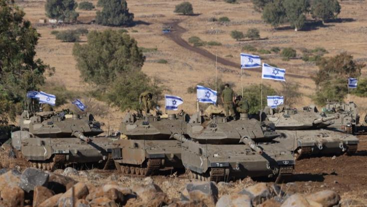 לוחם מילואים הושעה למשך חצי שנה לאחר שתלה כרזות מחאה על שיירה בעזה