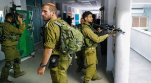 מילואמניקים מתאמנים בבית ספר בגולן במהלך המלחמה צילום:  Michael Giladi/Flash90  חדשות