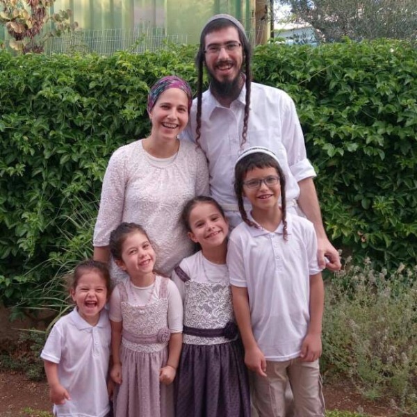 Hadas Tapuchi with her husband and children