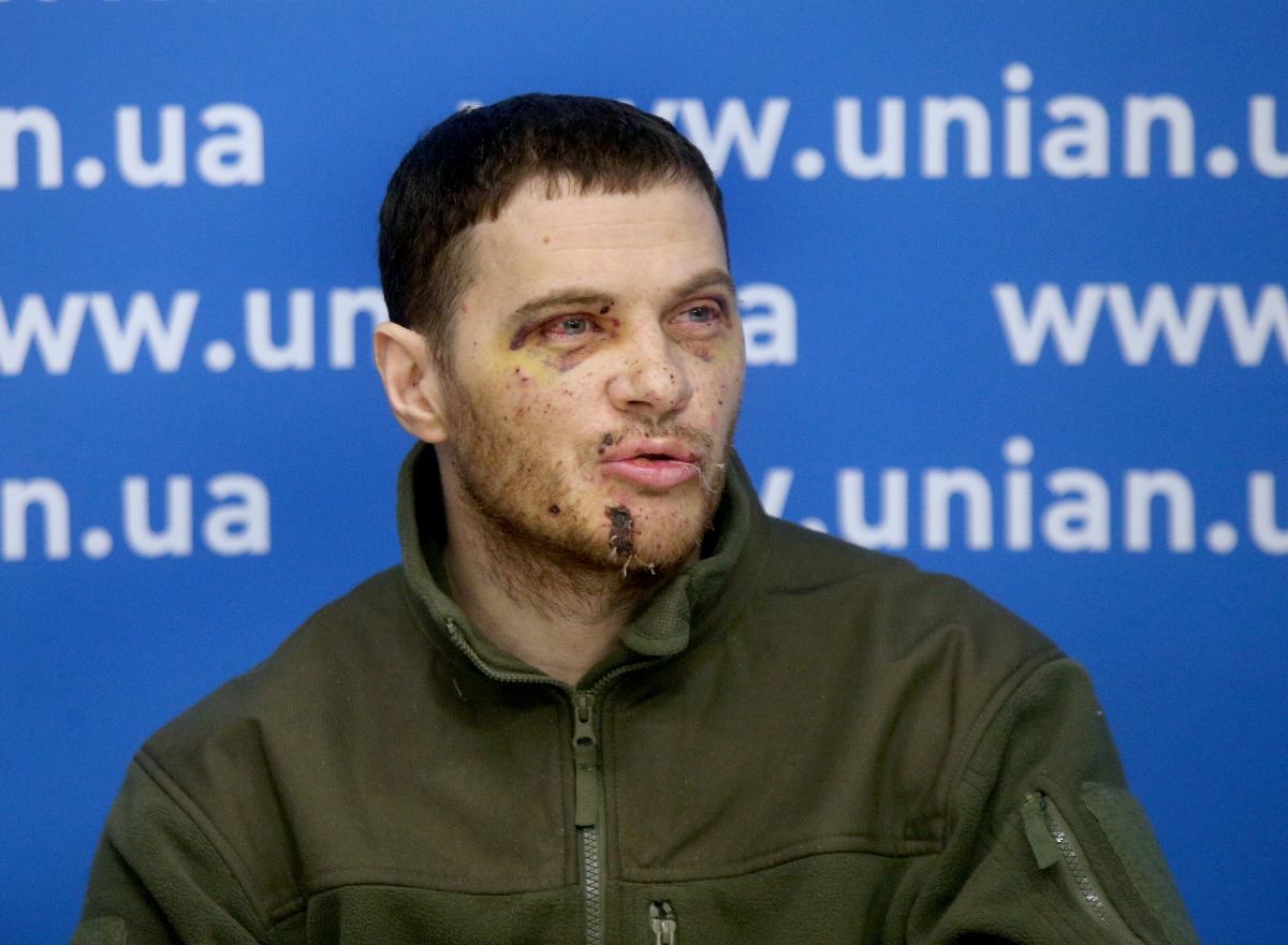 חייל רוסי שנתפס במהלך מסיבת עיתונאים, בסוכנות הידיעות UNIAN, בקייב