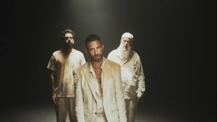 שלומי שבן לצד שולי רנד ורביד פלוטניק. כנען